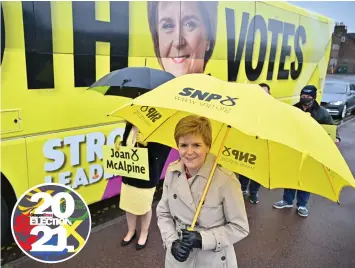  ??  ?? Nicola Sturgeon with the SNP campaign bus