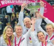  ?? AFP ?? Members of Czech Fed Cup team pose with the winners’ trophy after blanking USA 30 in the final in Prague on Sunday.