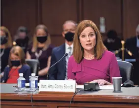  ?? PATRICK SEMANSKY/AP ?? Supreme Court nominee Amy Coney Barrett speaks during a confirmati­on hearing before the Senate Judiciary Committee in Washington, D.C., on Monday.