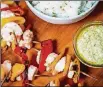  ?? HENRI HOLLIS/ HENRI.HOLLIS@AJC.COM ?? Shrimp and Pepper Skewers with Creamy Pesto Dipping Sauce.