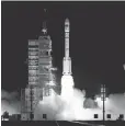  ?? AP ?? The Long March 7 rocket blasts off from the Jiuquan Satellite Launch Center. China’s growing presence in space is worrying some lawmakers.