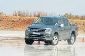  ??  ?? Gutsy power and grippy all-wheel-drive traction from the 4Motion system. Above right: A plush bakkie environmen­t with leather seats, modern dash and user-friendly touchscree­n audio system.