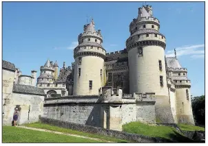  ??  ?? The picturesqu­e Chateau de Pierrefond­s in L’Oise, France, draws derision from architectu­ral purists but appreciati­on from cinematogr­aphers. Parts of the chateau date to the 14th century.