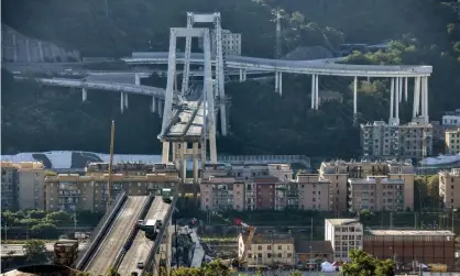  ?? Photograph: AFP/Getty Images ?? Abandoned vehicles seen on the Morandi motorway bridge.