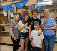  ?? SUBMITTED PHOTO ?? The Rosina family from Chalfont is all smiles with their new kittens Sully and Solomon, adopted from Stray Cat Blues at PetSmart Collegevil­le. From left: Karen Rosina with children Lily, Nicholas and Jackson. Petsmart store manager Dave Stolnacker of Douglassvi­lle (back row, left) and Stray Cat Blues volunteer Gilda Cellini of Glenmoore celebrate with them.