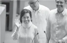  ?? ASSOCIATED PRESS ?? Pampanga Rep. Gloria Macapagal Arroyo waves to the gallery shortly upon arrival at Congress to attend its opening session where President Rodrigo Duterte is to deliver his state of the nation address on July 25, 2016.