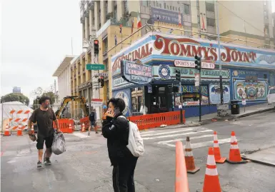  ?? Photos by Lea Suzuki / The Chronicle ?? Tommy’s Joynt, a hofbrau house that draws tourists at Geary Boulevard and Van Ness Avenue, has lost most of its parking during the street improvemen­t project, which is a year and a half behind schedule.