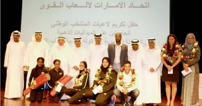  ?? KT photo by Mustafa ?? UAE athletes Alia Saeed Mohammad, Bethlem Desalegn Alia Al Hamadi and Fatima Al Hosani with physical fitness trainers, and UAE Athletics Federation and General Authority of Youth & Sports Welfare officials in Dubai. —