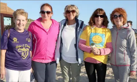  ??  ?? Enniscorth­y ladies Phil Millar, Sinead Carty, Carmel Kehoe, Elizebeth Fitzgerald and Mary O’Neill at the Summer Solstice Walk and Ceremony of Light and Healing on Curracloe Beach in aid of the Hope Cancer Support Centre.