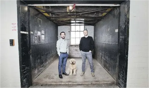  ?? PETER J THOMPSON / NATIONAL POST ?? Flip Accounting co-founders Mike MacDonald, left, and Matt Hick at their Toronto offices.