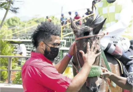  ?? (Photo: Joseph Wellington) ?? Trainer Steven Todd showing his appreciati­on for Labycka.