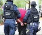  ?? WALES POLICE/AFP NEW SOUTH ?? Australian police have been carrying out raids across the country due to concerns over the threat of terrorism.