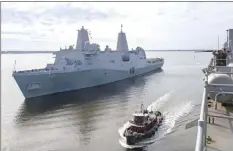  ??  ?? The San Antonio-class amphibious transport dock ship USS Arlington (LPD 24) getting underway from Morehead City in North Carolina. — AFP photos