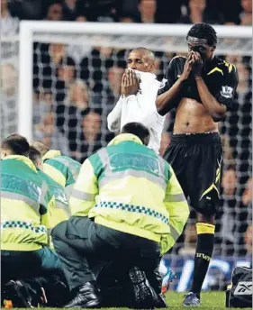  ?? Photo: REUTERS
Photo: REUTERS ?? Instinctiv­e response: Tottenham Hotspur’s Jermain Defoe, left, and Bolton Wanderers’ Dedryck Boyata react as medics attend to Bolton’s Fabrice Muamba during their FA Cup quartefina­l match at White Hart Lane on March 17 last year.