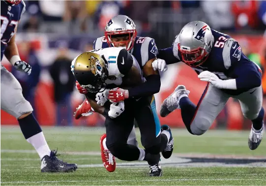  ?? Kevin C. Cox / Getty Images ?? The Eagles’ Malcolm Jenkins (left) has been a mentor to the Patriots’ Eric Rowe (center) for a couple years.