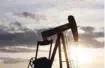  ??  ?? An oil pump jack pumps oil in a field in Calgary, Alberta, Canada. — Reuters