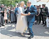  ??  ?? VIP: Putin dances with Austria’s foreign minister, Karin Kneissl