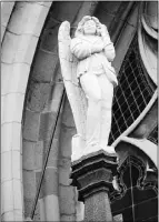  ??  ?? The statue of the Little Angel decorating St. John the Evangelist
Cathedral in ’s-hertogenbo­sch