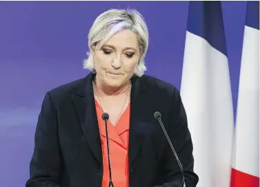  ?? THIERRY CHESNOT/GETTY IMAGES ?? Marine Le Pen, French presidenti­al candidate for the far-right Front National party, speaks Sunday at the Chalet du Lac in Paris after her defeat in the second round. Many voters opted to abstain or cast blank ballots.