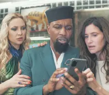  ?? — The Washington Post photo ?? (From left) Kate Hudson, Leslie Odom Jr. and Kathryn Hahn in ‘Glass Onion’.