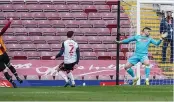  ??  ?? CITY GENT Bradford City’s Danny Rowe scores