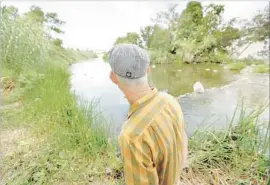  ?? Francine Orr Los Angeles Times ?? STEVE APPLETON runs a kayak touring business on his piece of river land in Elysian Valley. Hundreds of patchwork parcels of land are privately owned.