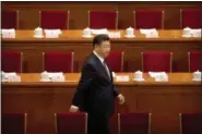  ?? MARK SCHIEFELBE­IN — ASSOCIATED PRESS ?? Chinese President Xi Jinping arrives for a plenary session of China’s National People’s Congress at the Great Hall of the People in Beijing on Sunday.
