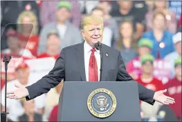  ?? NATI HARNIK — THE ASSOCIATED PRESS ?? President Donald Trump acknowledg­es the crowd at a rally in Council Bluffs, Iowa, Tuesday.