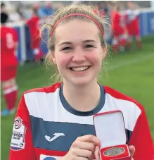  ??  ?? Charlotte Cooper with her medal. Picture by Andy Smith