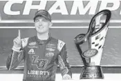  ?? TERRY RENNA/AP ?? William Byron celebrates winning the NASCAR Xfinity Series championsh­ip in Homestead on Saturday.