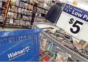  ?? [AP PHOTO] ?? Wal-Mart Stores Inc. said Thursday that online sales soared 60 percent in the past three months.