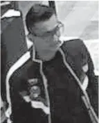  ?? VIA TRANSLINK ?? A suspect in a SkyTrain theft scheme is seen in surveillan­ce video.