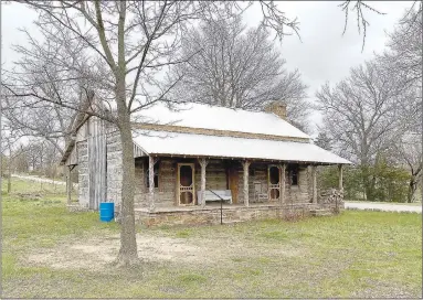  ?? PHOTOS BY MAYLON RICE SPECIAL TO ENTERPRISE-LEADER ?? The 1828 homestead of the Rev. George and Elizabeth Morrow has been restored by owners Damon and Margaret Reed. They do not plan to live in the log cabin or rent it out but wanted to put it back as it was for the community.