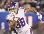  ?? Adam Hunger / Associated Press ?? New York Giants tight end Evan Engram runs the ball against the Dallas Cowboys on Monday.