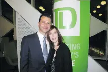  ??  ?? TD Canada Trust senior vice-president Robert Ghazal and his wife Claudia had a wonderful time at the fabulous opening party of the new Calgary Public Library. TD is a substantia­l donor to the library.