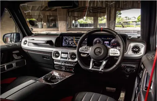  ??  ?? clockwise from top Widescreen cockpit easy to navigate; it wouldn't be a G-class without three diff locks; Burmester sound system costs R23k; the grab handle's still there but now it's embellishe­d with carbon-fibre trim; rear legroom acceptable.