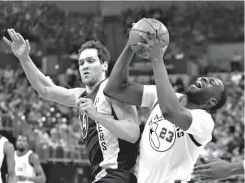  ?? Associated Press ?? ■ Golden State Warriors forward Draymond Green (23) is fouled by Indiana Pacers forward Bojan Bogdanovic (44) during the first half of an NBA basketball game Thursday in Indianapol­is.