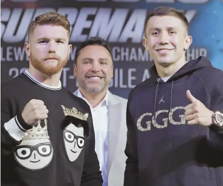  ?? AP PHOTO ?? COLLISION COURSE: Canelo Alvarez (left) and Gennady Golovkin mug for the cameras as they hype Saturday night’s big fight in Las Vegas.