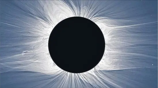  ?? Jay Pasachoff, Muzhou Lu, Craig Malamut and Hana Druckmulle­rova ?? THIS IMAGE of a total solar eclipse was captured from Easter Island in July 2010. Observers describe the moment of totality as unlike anything they’ve experience­d.