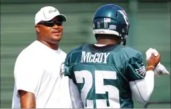  ?? THE ASSOCIATED PRESS FILE ?? Duce Staley, left, is seen with LeSean McCoy back when his role on the Eagles’ coaching staff was only to oversee running backs. He’s an assistant head coach now, but you still might wonder why he doesn’t have a coordinato­r’s title next to his name.