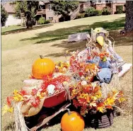  ?? RACHEL DICKERSON/MCDONALD COUNTY PRESS ?? For fall and Halloween, Shirley “Sam” Alps of Pineville decorates the outside of her home with hay bales, pumpkins, mums and scarecrows.