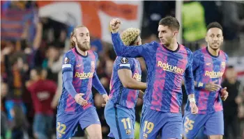  ?? — AFP photo ?? Barcelona’s Ferran Torres (centre) celebrates scoring his team’s first goal during the Europa League agaisnst SSC Napoli at the Camp Nou stadium in Barcelona.