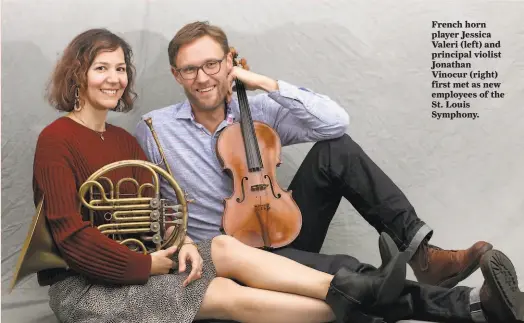  ?? Liz Hafalia / The Chronicle ?? French horn player Jessica Valeri (left) and principal violist Jonathan Vinocur (right) first met as new employees of the St. Louis Symphony.