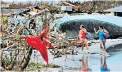  ??  ?? The scenes of devastatio­n at Marsh Harbour in Abaco Island, Bahamas