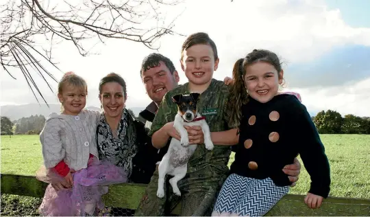  ?? FAIRFAX NZ ?? The Mcnaughton­s started with nothing but now own one farm and lease another. From left: Brad, Addie, Peyton, Chantelle and Jayden with their new puppy Rusty.