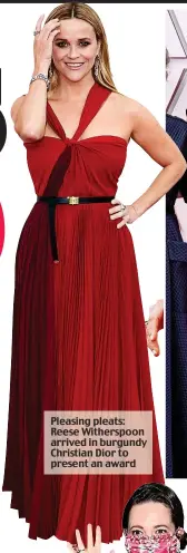  ??  ?? Pleasing pleats: Reese Witherspoo­n arrived in burgundy Christian Dior to present an award