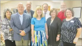  ?? Westside Eagle Observer/SUSAN HOLLAND ?? New officers of the Kiwanis Club of Gravette pose with installing officer Sue Storey (right) following their installati­on at the club’s annual banquet Sept. 23. Pictured are Brenda Yates, secretary (front, left); Dennis Kurczek, president-elect; Dr, Nancy Jones, president; Lavon Stark, secretary; Storey; Richard Page, (back, left), and Zane Vanderpool, board members; and Dan Yates, treasurer.