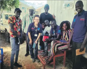  ??  ?? Anna with her team in South Sudan.