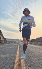  ?? MICHAEL WARDIAN ?? Ultra-runner Michael Wardian traverses a stretch of Route 50 in western Nevada on May 8.