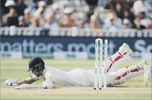  ?? PICTURE: NICK POTTS/PA ?? OUT OF TIME: Joe Root dives in vain to prevent being run out by Virat Kohli who added insult to injury by mocking the England captain on day one of the first Test.